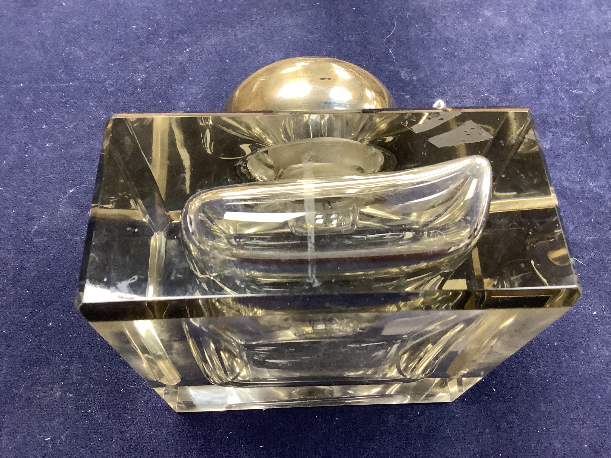 A George V large silver topped glass inkwell, makers mark C and co-, London 1912, 12.5 cm wide